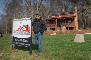 Julian Montoya in front of one of his recently-completed projects.