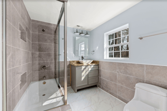 A newly-renovated bathroom in Julian's recently-completed real estate project.